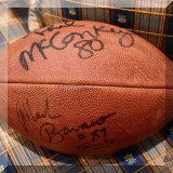 C06. Phil McConkey and Mark Bavaro signed football. 